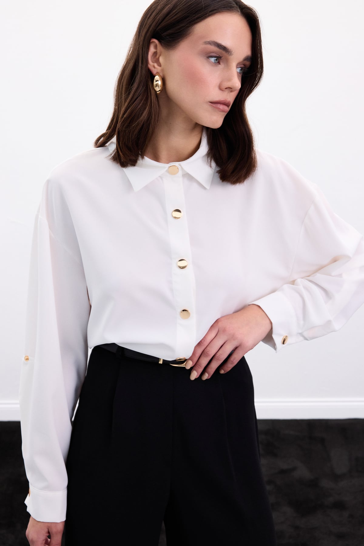 white satin shirt with gold buttons