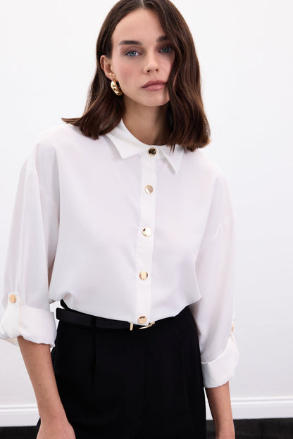 white satin shirt with gold buttons
