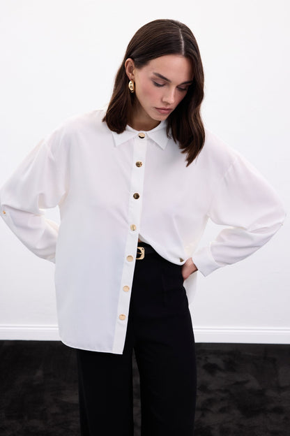 white satin shirt with gold buttons